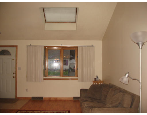 196 Arnold Avenue Springfield, MA 01119 - Photo 8 of 14 a living room with a couch and potted plant