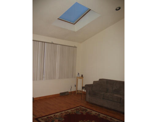 196 Arnold Avenue Springfield, MA 01119 - Photo 10 of 14 a living room with furniture and a window