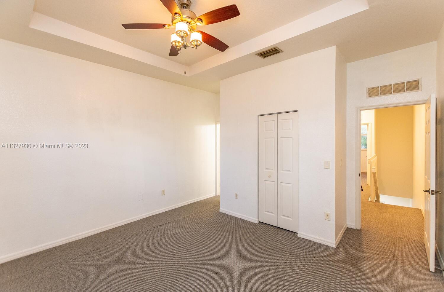 4979 Southwest 140th Terrace, Unit 8 Miramar, FL 33027 - Photo 25 of 43 a view of an empty room