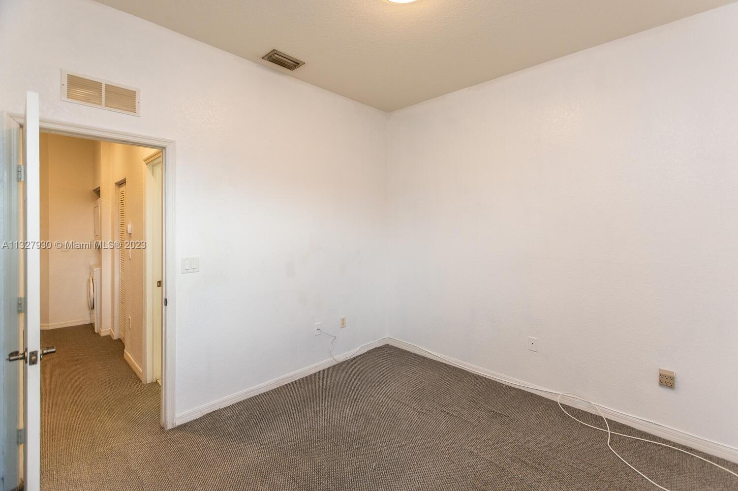 4979 Southwest 140th Terrace, Unit 8 Miramar, FL 33027 - Photo 31 of 43 an empty room with a bathroom