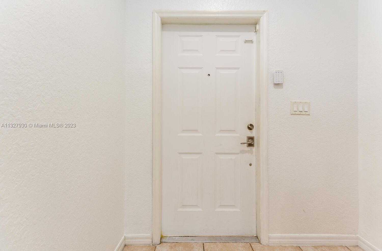 4979 Southwest 140th Terrace, Unit 8 Miramar, FL 33027 - Photo 5 of 43 a bathroom with a shower
