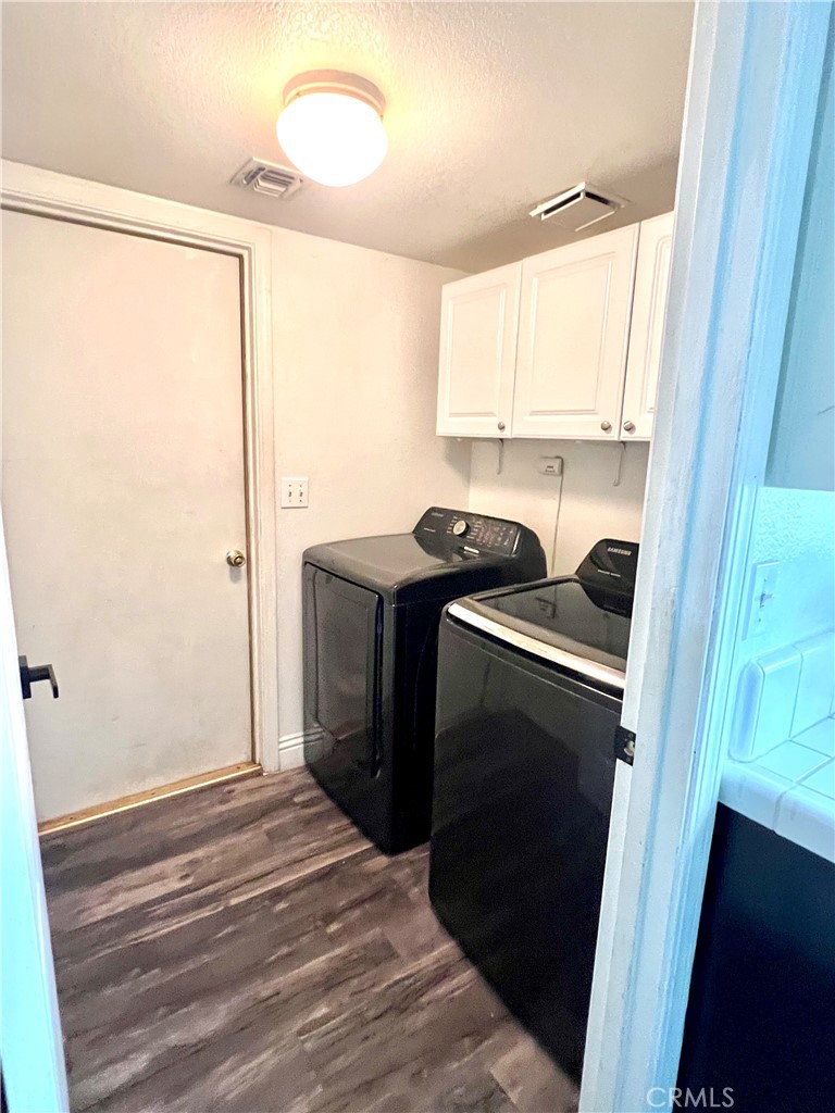 14016 Las Entradas Bakersfield, CA 93314 - Photo 13 of 25 a kitchen with a refrigerator and a sink