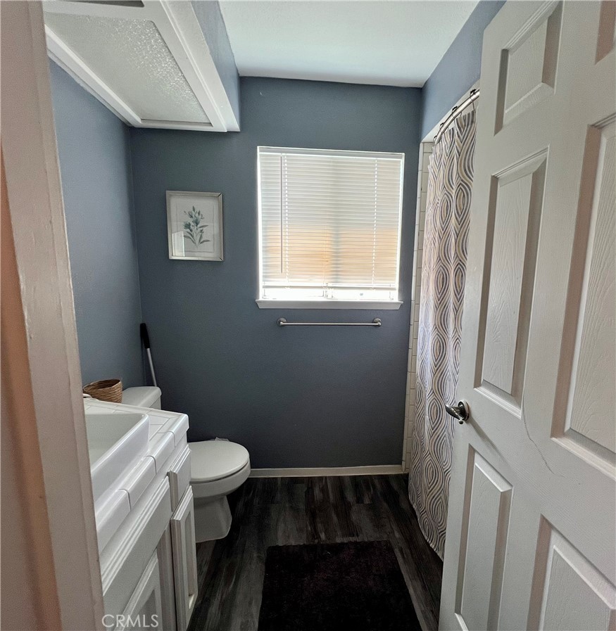 14016 Las Entradas Bakersfield, CA 93314 - Photo 22 of 25 a bathroom with a sink and a toilet