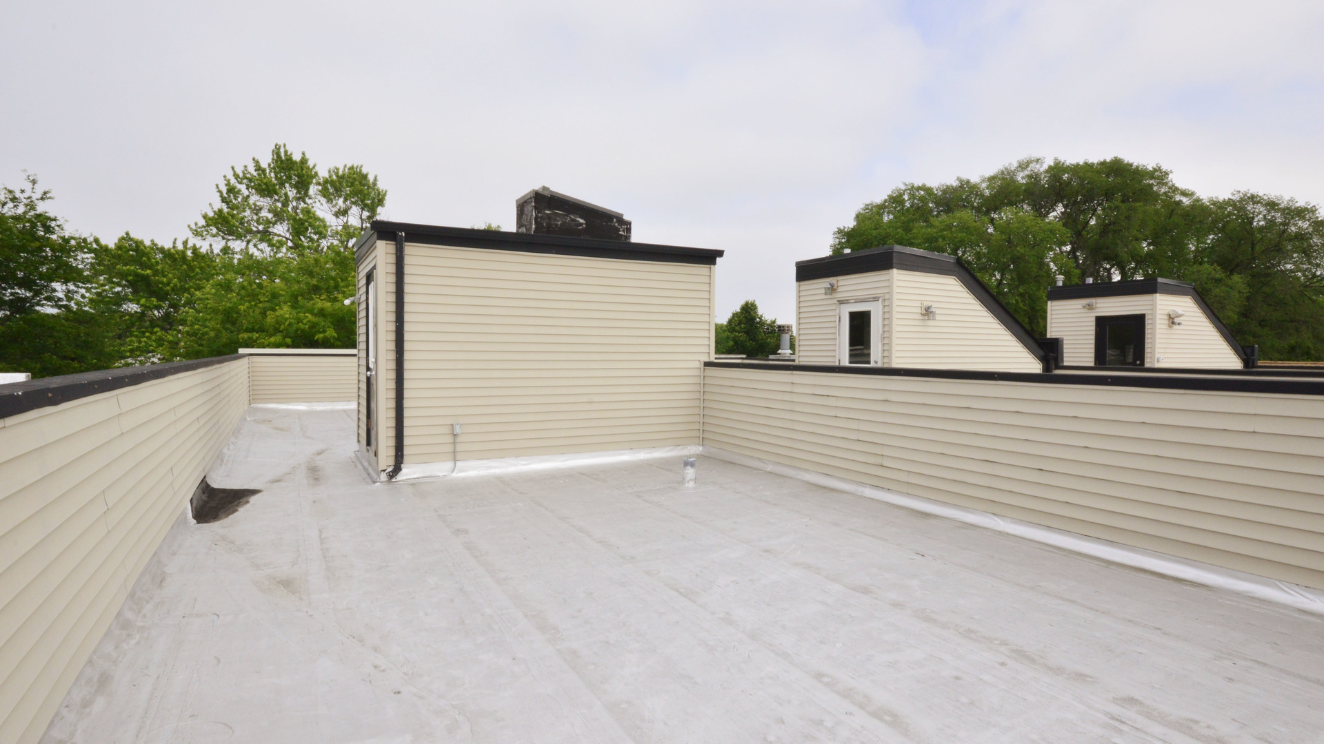 Undisclosed Address Chicago, IL 60618 - Photo 5 of 40 a view of a house with a garage