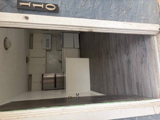 a view of storage and utility room