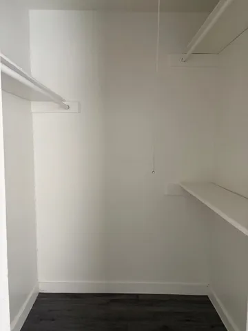 a view of small space with racks on the wall