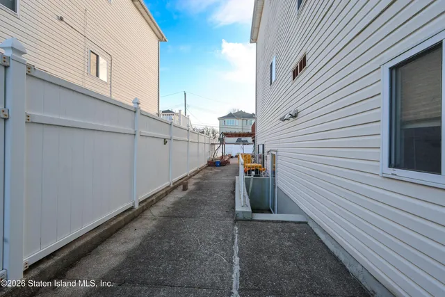 a view of a back yard of the house