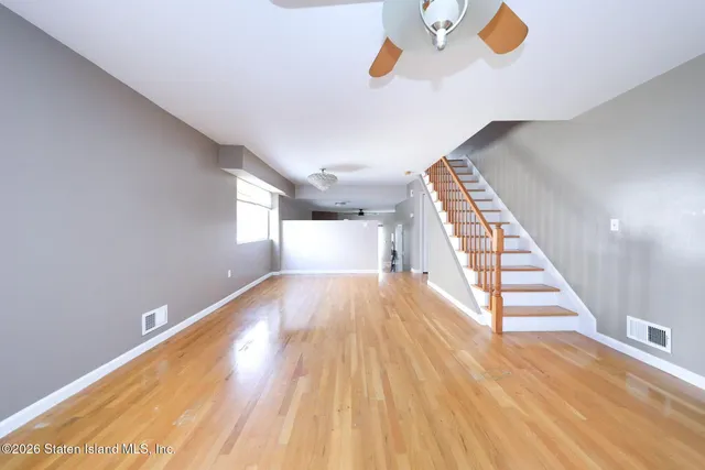 a view of entryway with wooden floor