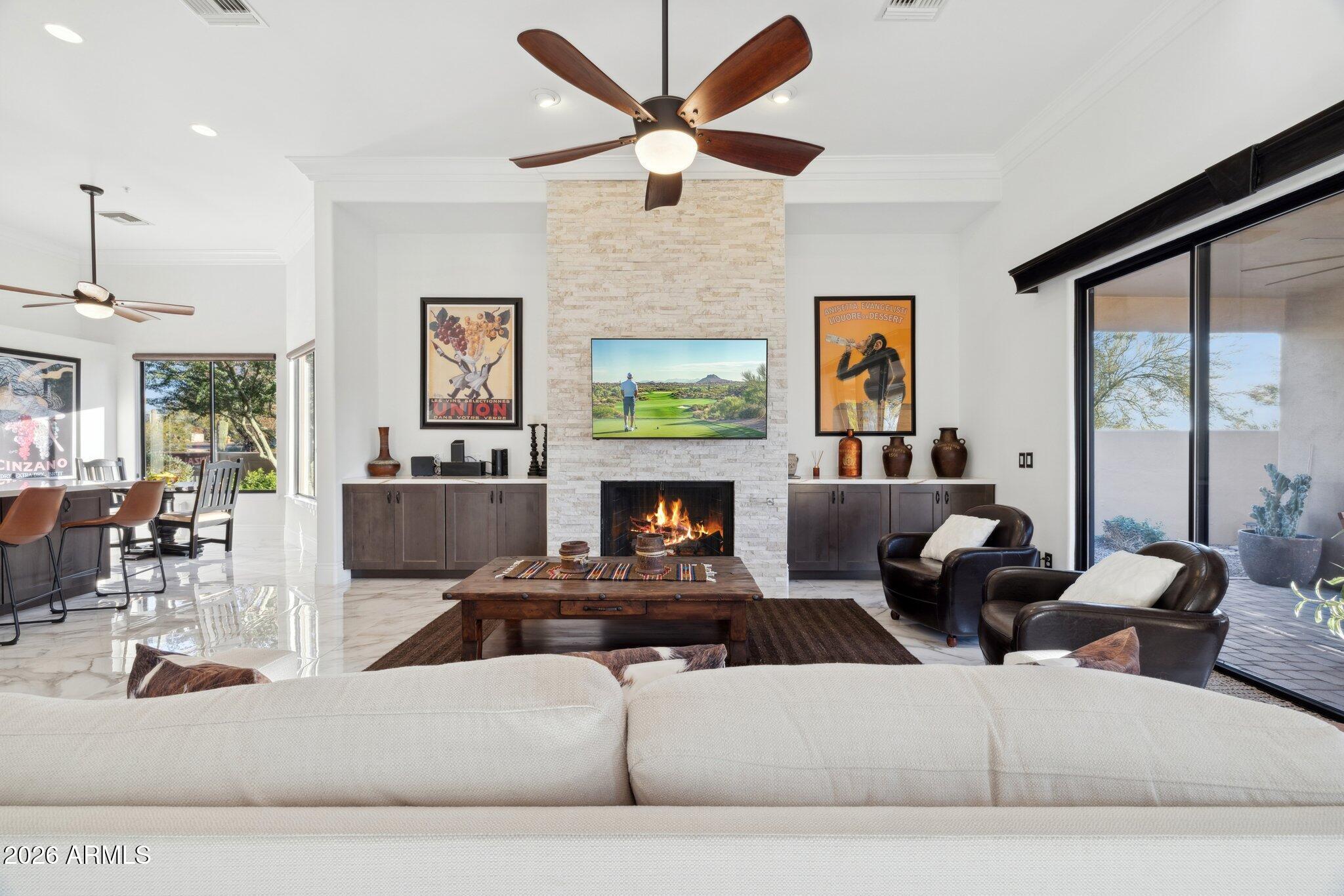 30600 North Pima Road, Unit 81 Scottsdale, AZ 85266 - Photo 13 of 66 Family room with stacked stone fireplace