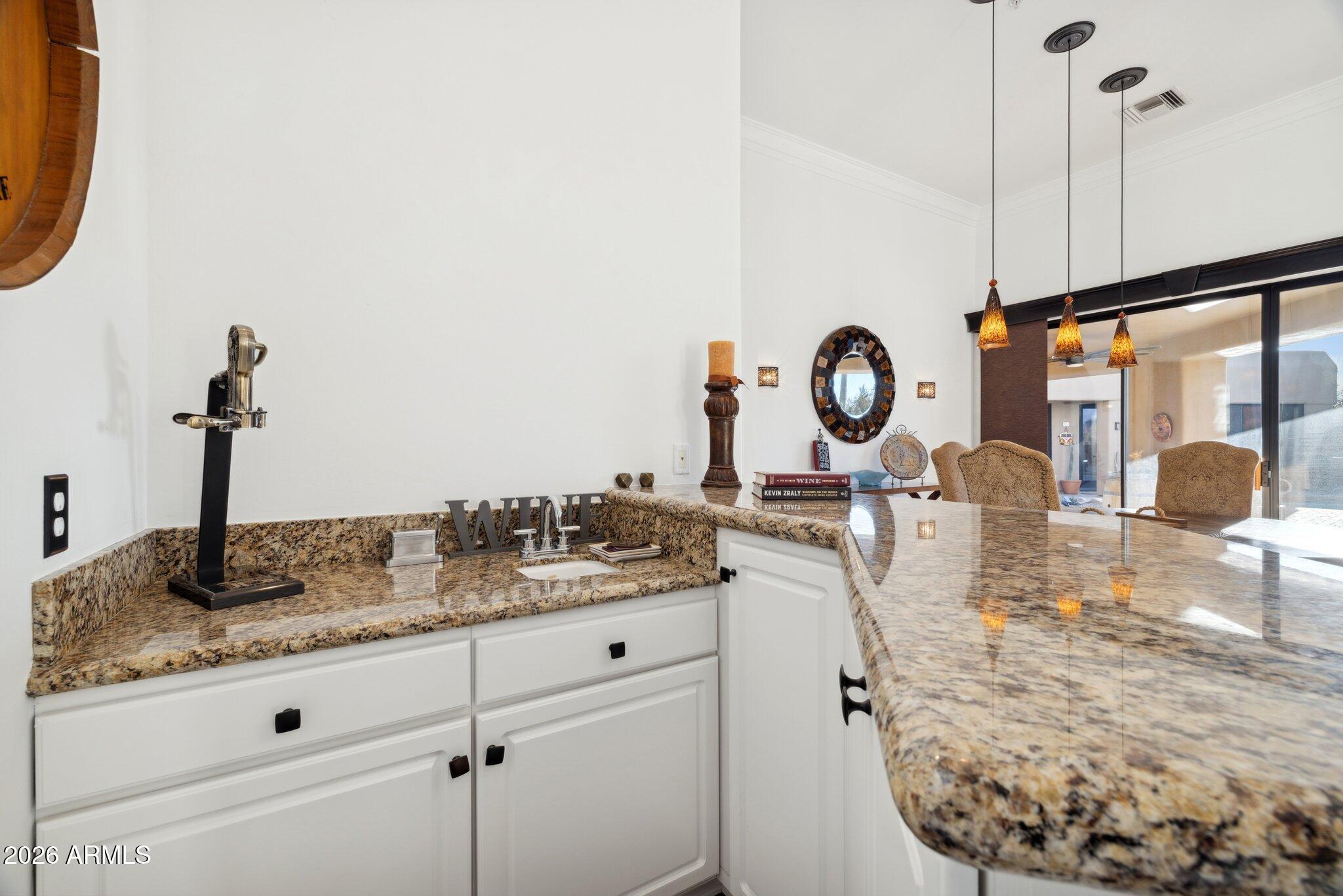 30600 North Pima Road, Unit 81 Scottsdale, AZ 85266 - Photo 20 of 66 Wet bar near dining room