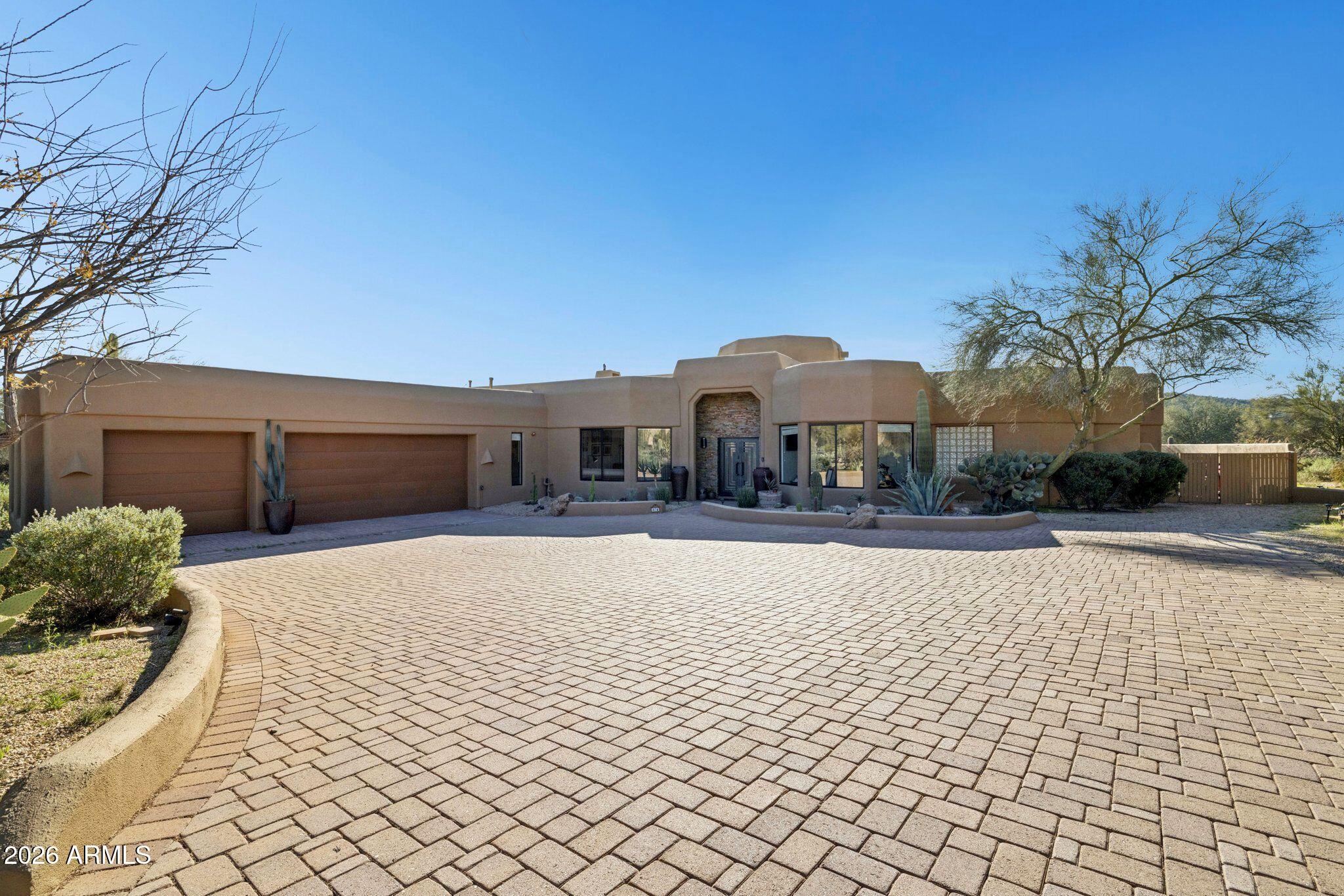 30600 North Pima Road, Unit 81 Scottsdale, AZ 85266 - Photo 5 of 66 Long stone paver driveway
