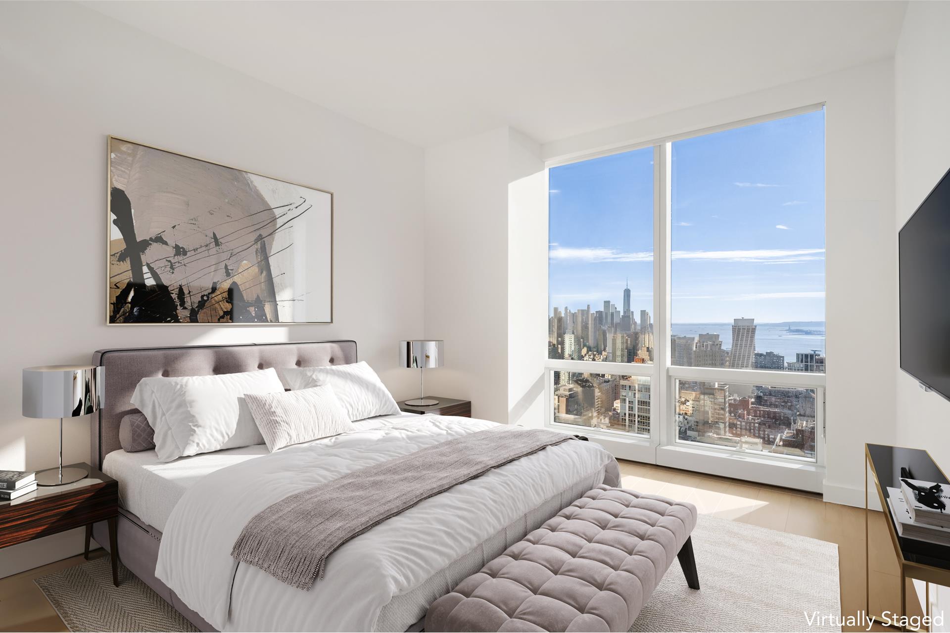 15 Hudson Yards, Unit 38C Manhattan, NY 10001 - Photo 12 of 31 a bedroom with a large bed and a painting on the wall