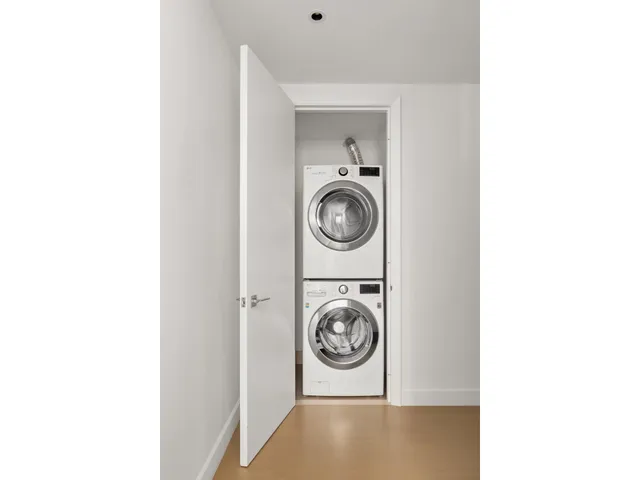 a very nice looking room with lots of furniture and a large window