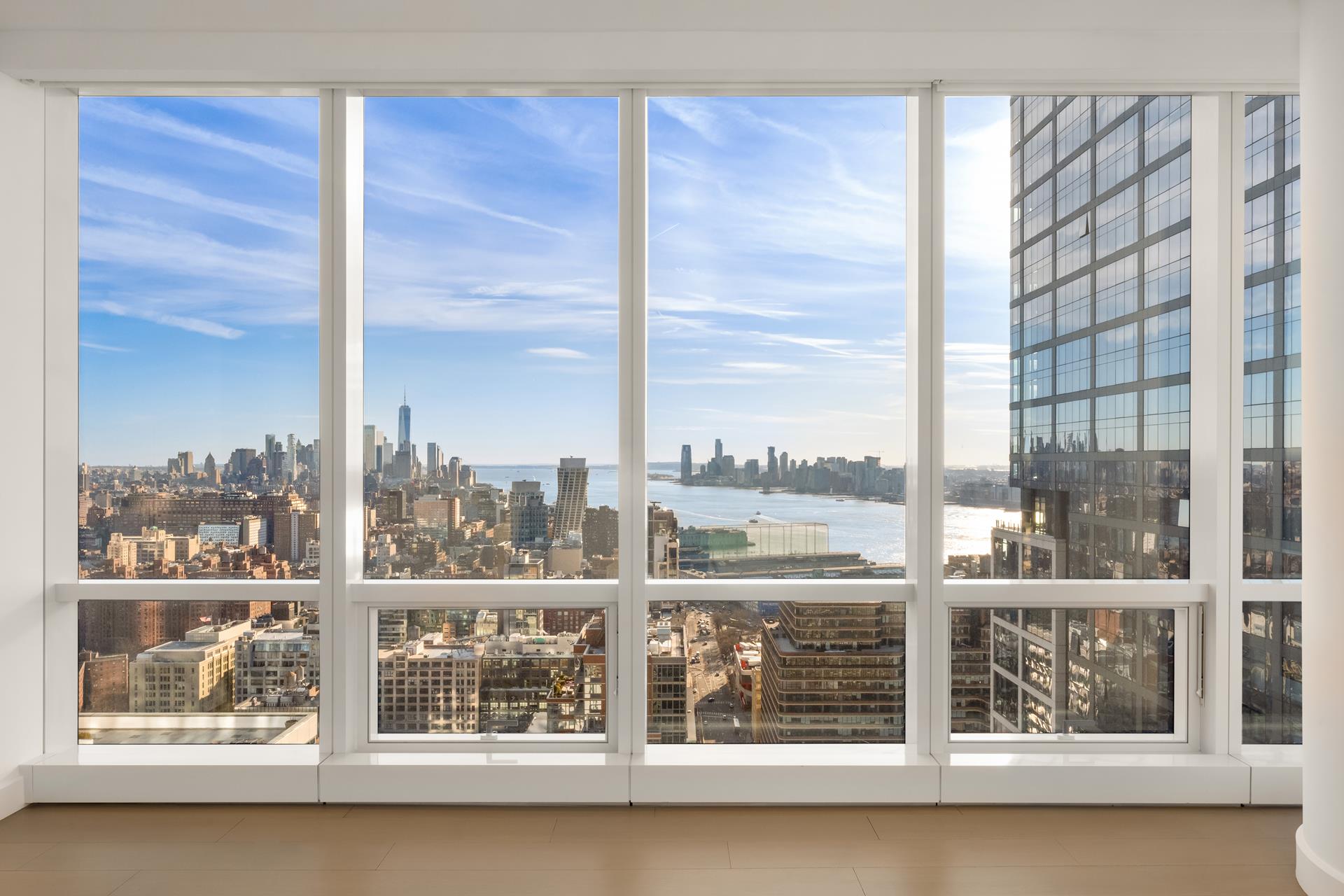 15 Hudson Yards, Unit 38C Manhattan, NY 10001 - Photo 5 of 31 a view of a city from a balcony