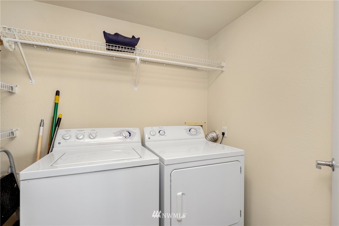 9805 Avondale Road Northeast, Unit L237 Redmond, WA 98052 - Photo 15 of 25 a utility room with dryer and washer