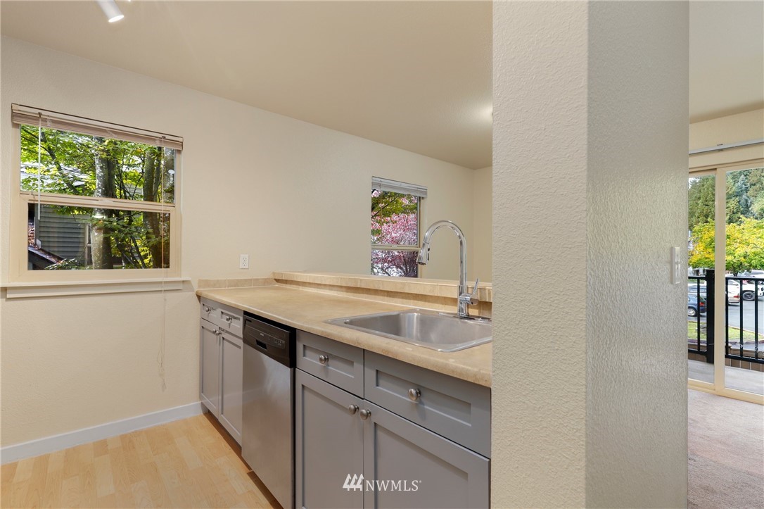 9805 Avondale Road Northeast, Unit L237 Redmond, WA 98052 - Photo 5 of 25 a view with a sink and a window