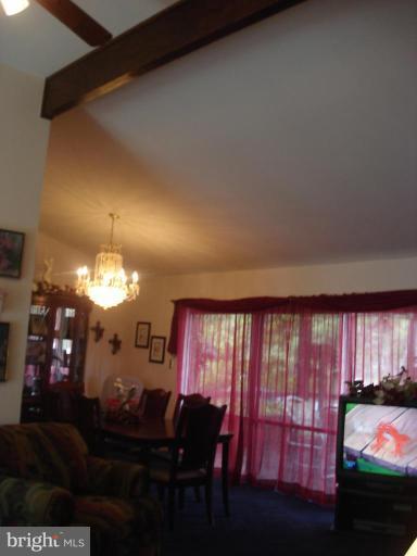 9311 Pella Place Clinton, MD 20735 - Photo 2 of 24 a living room with furniture fireplace and flat screen tv