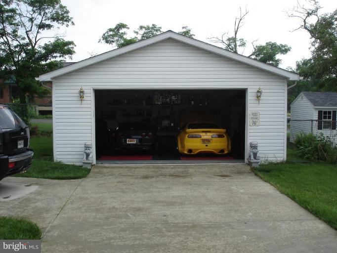 9311 Pella Place Clinton, MD 20735 - Photo 13 of 24 a view of a car in front of house