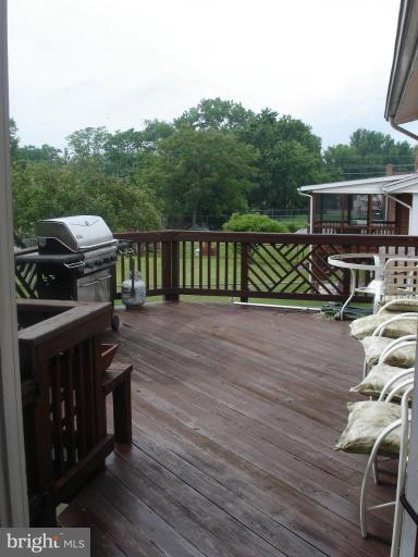 9311 Pella Place Clinton, MD 20735 - Photo 20 of 24 a view of a balcony with chairs
