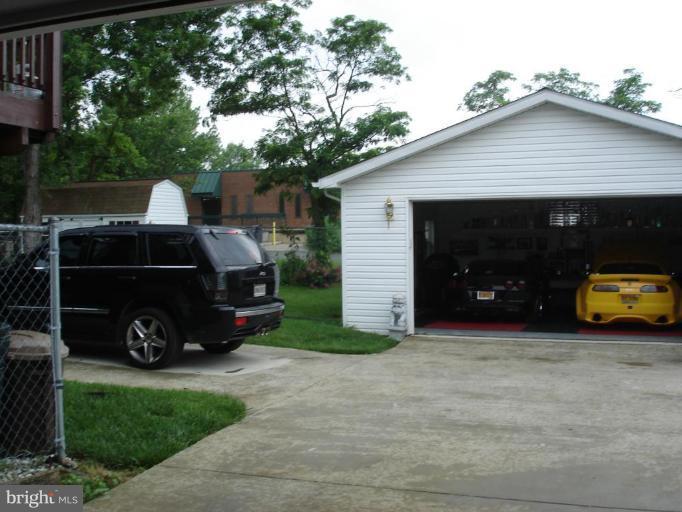 9311 Pella Place Clinton, MD 20735 - Photo 22 of 24 a view of a car in front of house