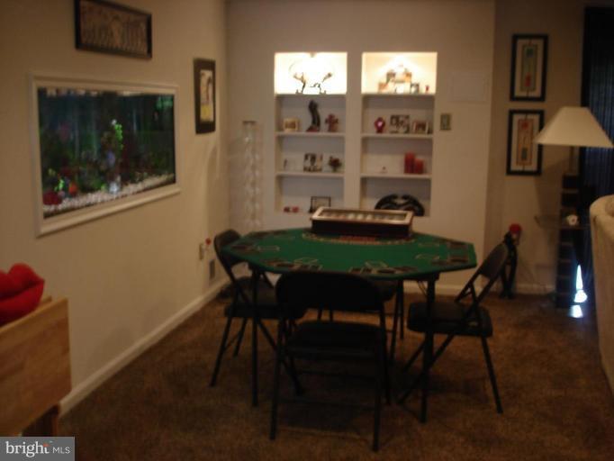 9311 Pella Place Clinton, MD 20735 - Photo 7 of 24 a dining room with furniture and window