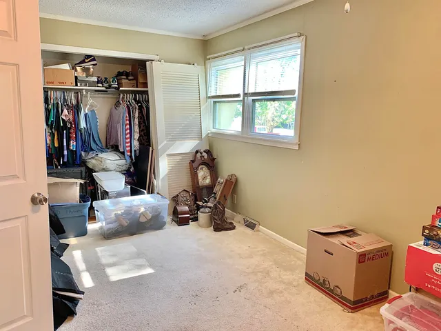 a room with furniture and window