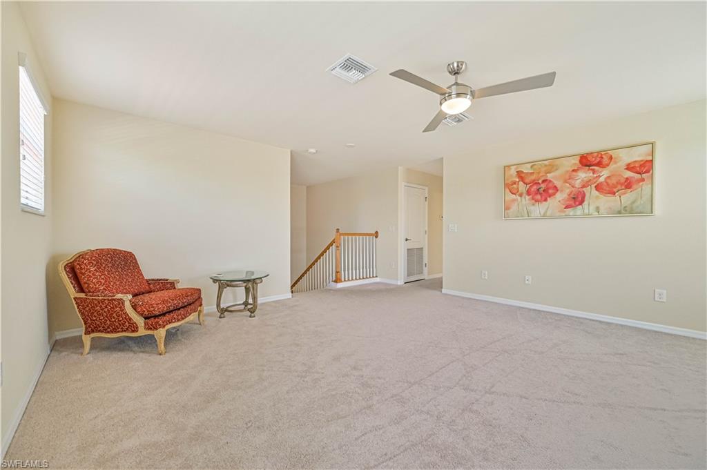 11686 Eros Road Lehigh Acres, FL 33971 - Photo 23 of 44 a view of livingroom with furniture and ceiling fan