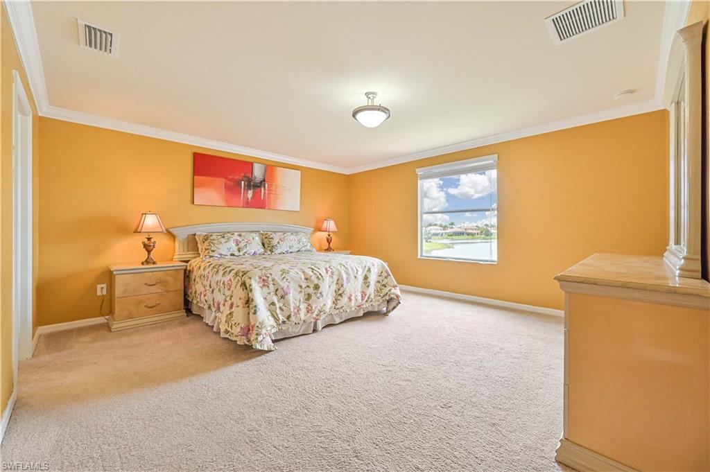 11686 Eros Road Lehigh Acres, FL 33971 - Photo 26 of 44 a bedroom with a bed and a window
