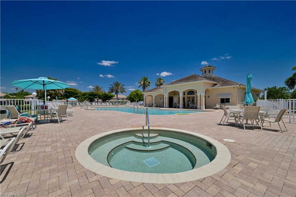 11686 Eros Road Lehigh Acres, FL 33971 - Photo 42 of 44 a swimming pool with outdoor seating yard and outdoor seating