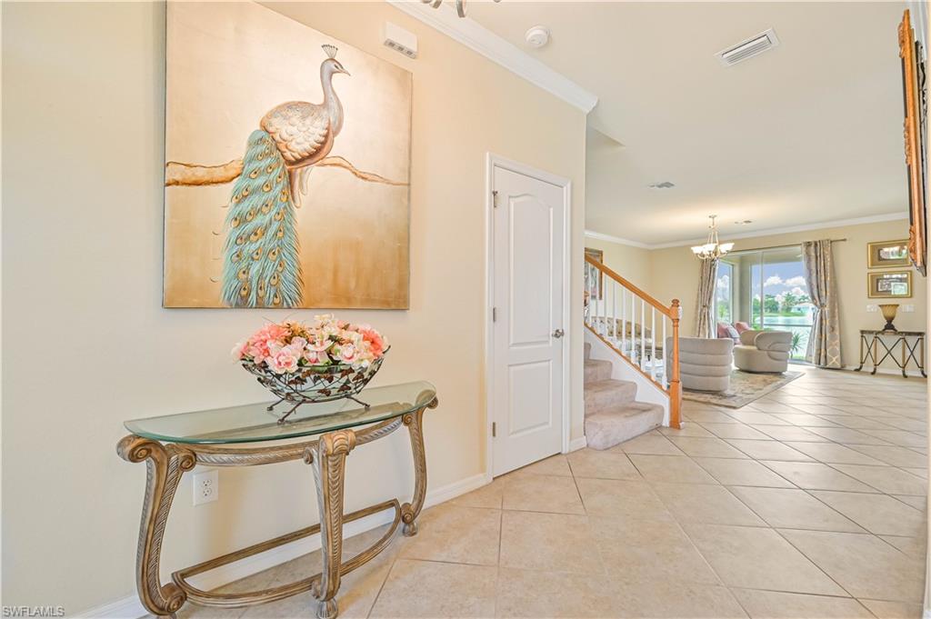 11686 Eros Road Lehigh Acres, FL 33971 - Photo 8 of 44 a view of a hallway with seating area
