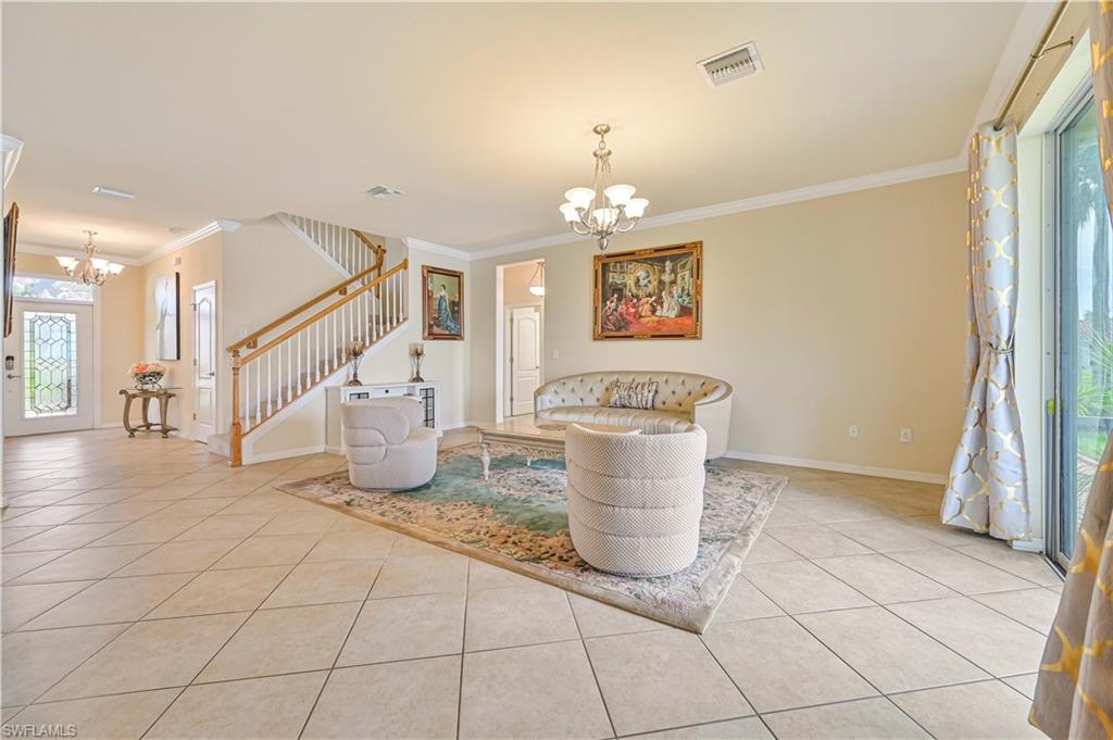 11686 Eros Road Lehigh Acres, FL 33971 - Photo 10 of 44 a view of a room with stair