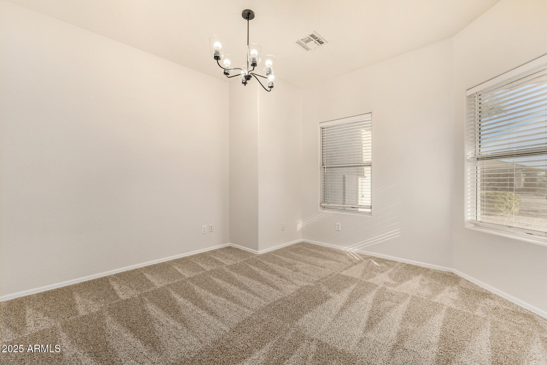 3622 South Joshua Tree Lane Gilbert, AZ 85297 - Photo 12 of 37 a view of empty room with windows