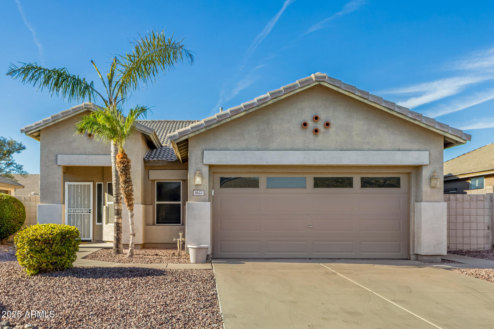 3622 South Joshua Tree Lane Gilbert, AZ 85297 - Photo 2 of 37 a view of a house with a yard