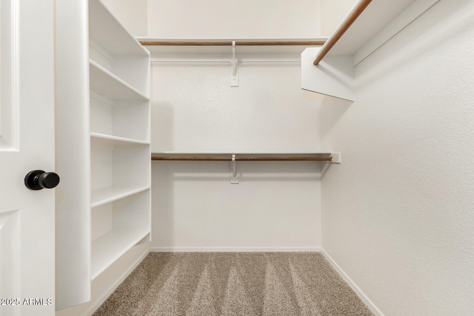 3622 South Joshua Tree Lane Gilbert, AZ 85297 - Photo 26 of 37 a view of an empty walk in closet