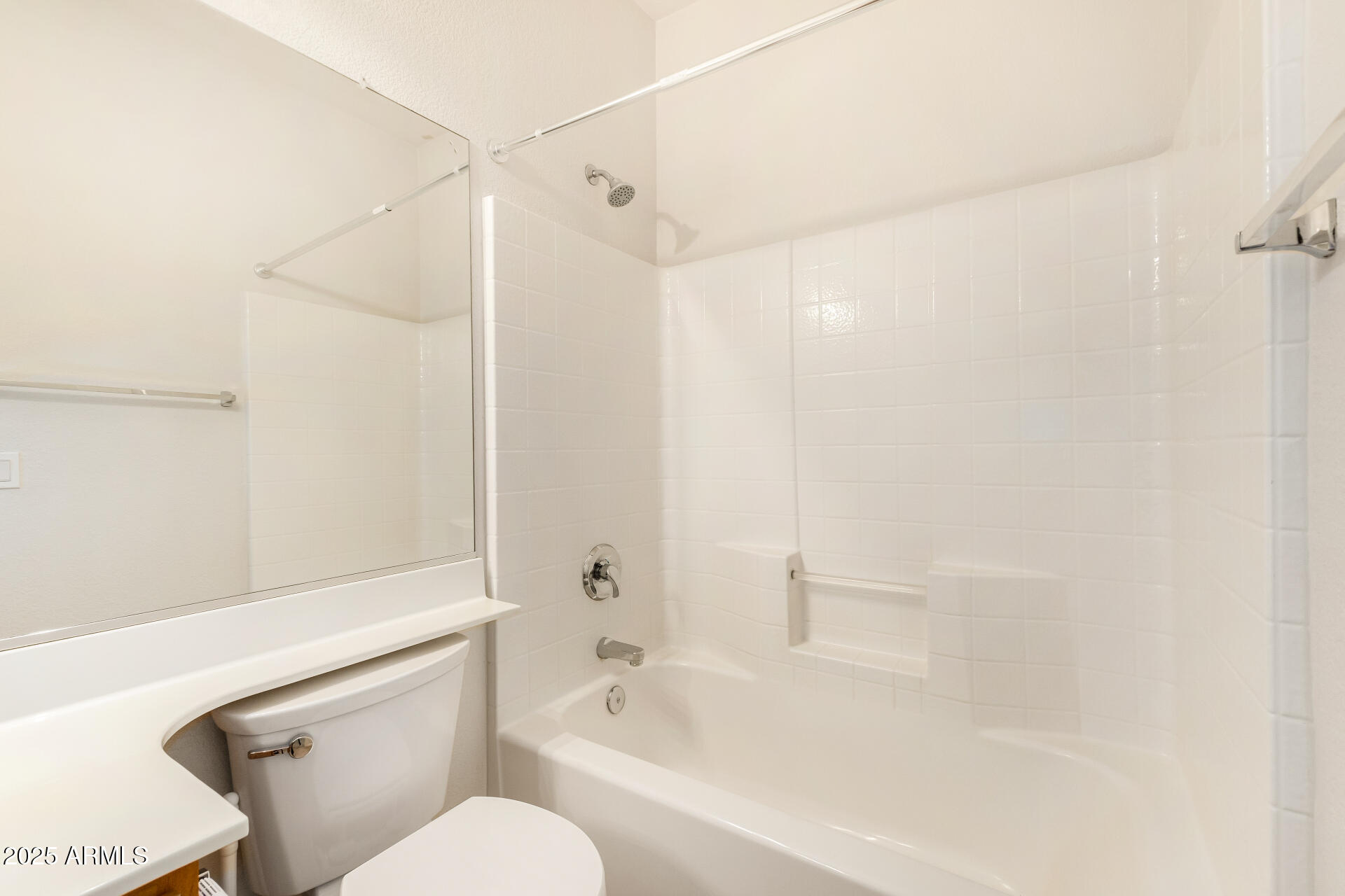 3622 South Joshua Tree Lane Gilbert, AZ 85297 - Photo 31 of 37 a bathroom with a bathtub and a toilet