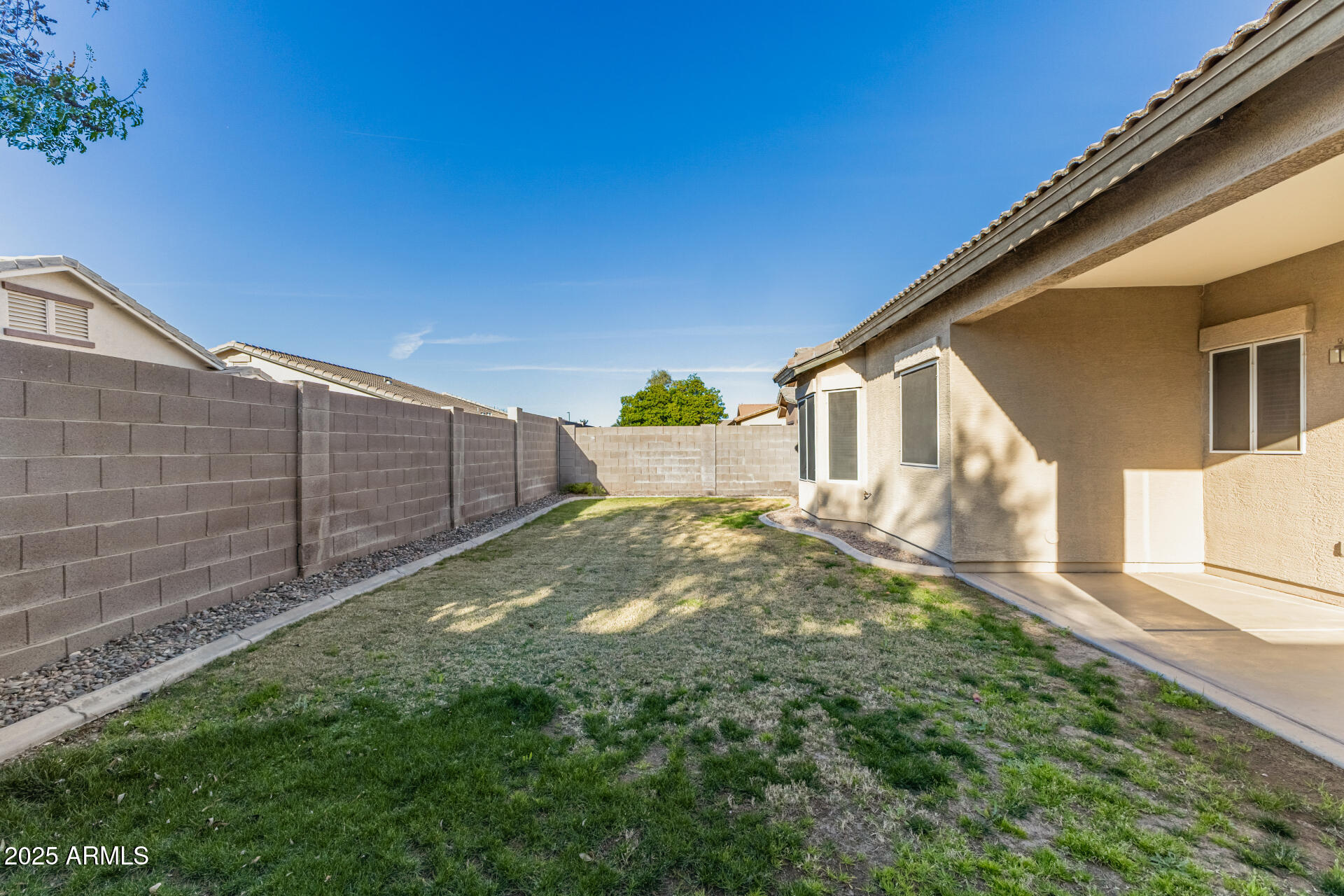 3622 South Joshua Tree Lane Gilbert, AZ 85297 - Photo 36 of 37 a view of backyard with a small cabin