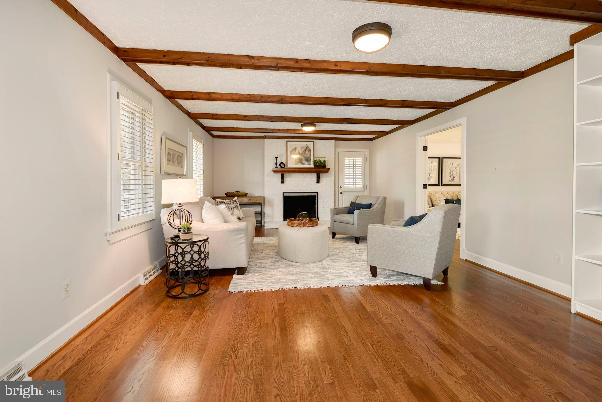 2813 Rifle Ridge Road Oakton, VA 22124 - Photo 11 of 41 HUGE FAMILY ROOM WITH COZY FIREPLACE & BUILT-INS