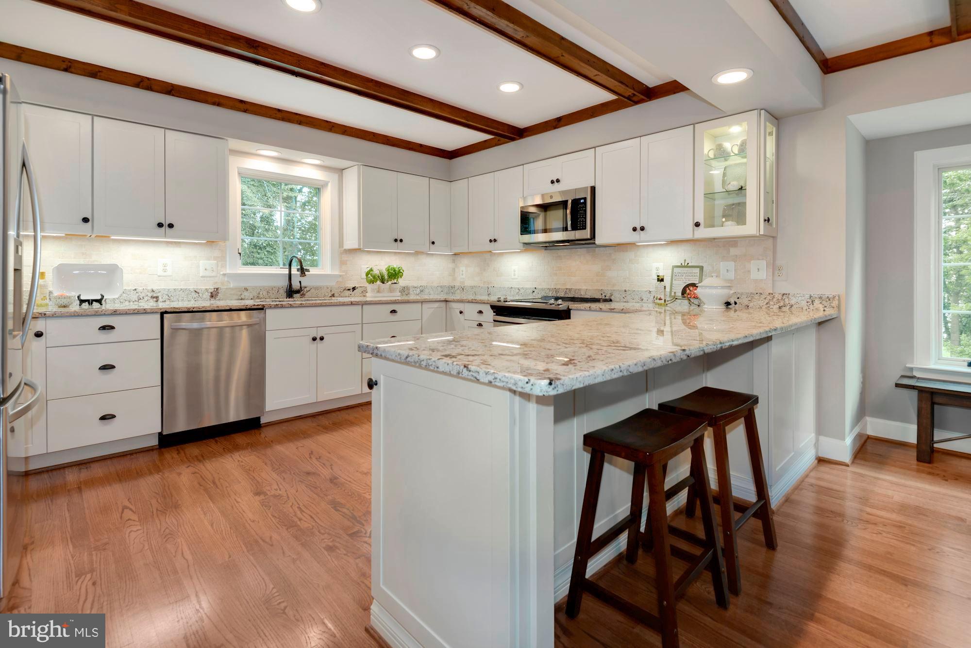 2813 Rifle Ridge Road Oakton, VA 22124 - Photo 15 of 41 A KITCHEN DESIGNED FOR THE WAY WE ENTERTAIN TODAY!