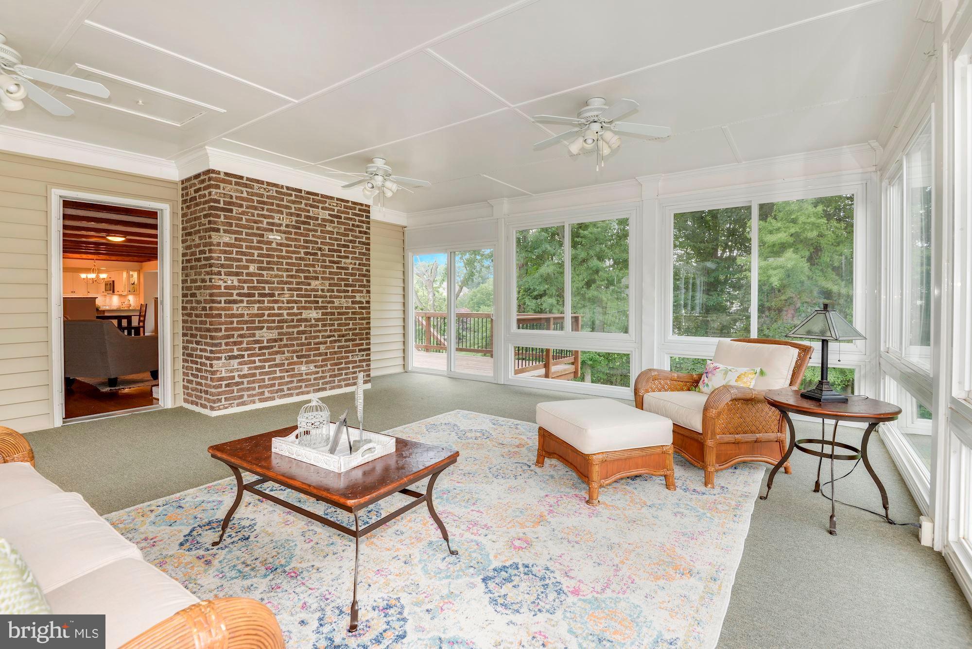 2813 Rifle Ridge Road Oakton, VA 22124 - Photo 22 of 41 FAMILY ROOM OPENS TO THIS HUGE SUNROOM