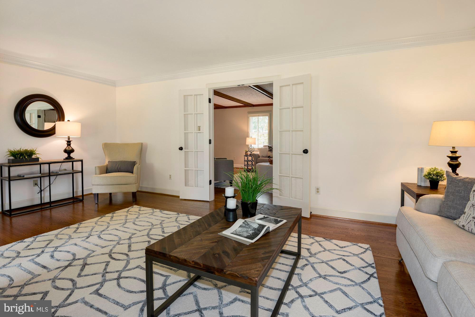 2813 Rifle Ridge Road Oakton, VA 22124 - Photo 7 of 41 LIVING ROOM W/GALSS FRENCH DOORS TO FAMILY ROOM