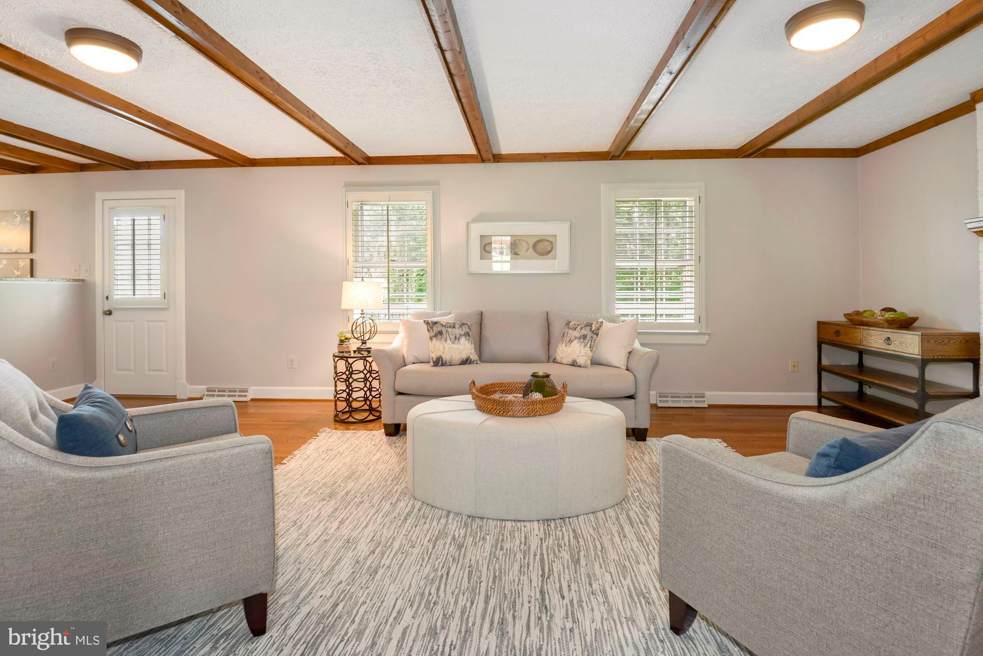 2813 Rifle Ridge Road Oakton, VA 22124 - Photo 9 of 41 FAMILY ROOM OPENS TO LARGE DECK AND SUNROOM