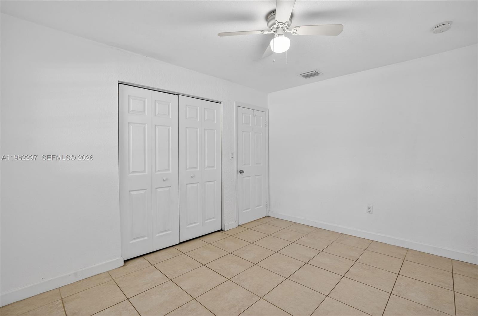 10325 Southwest 149th Terrace Miami, FL 33176 - Photo 13 of 34 a view of an empty room