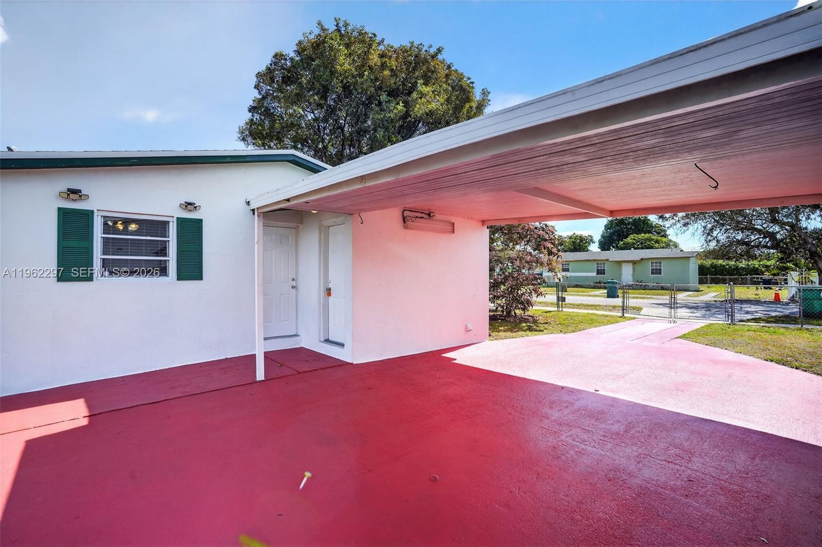 10325 Southwest 149th Terrace Miami, FL 33176 - Photo 15 of 34 an outdoor space with pool and table