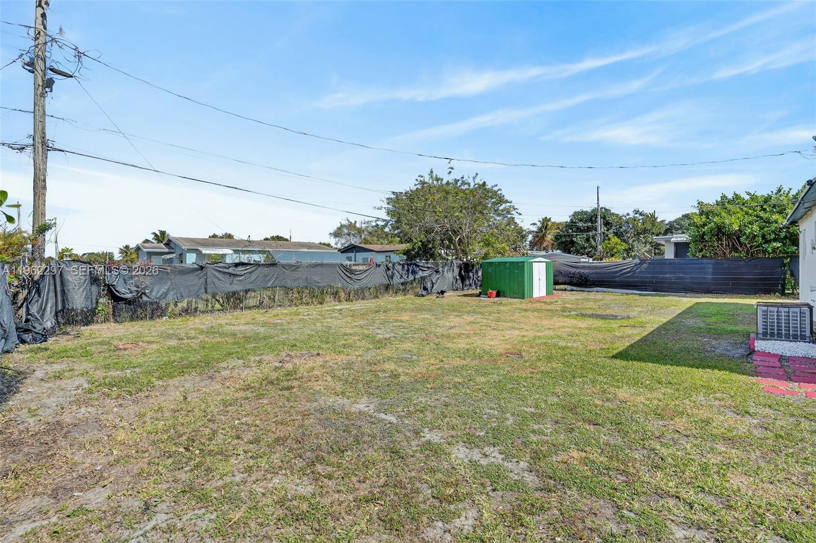 10325 Southwest 149th Terrace Miami, FL 33176 - Photo 17 of 34 a backyard of a house