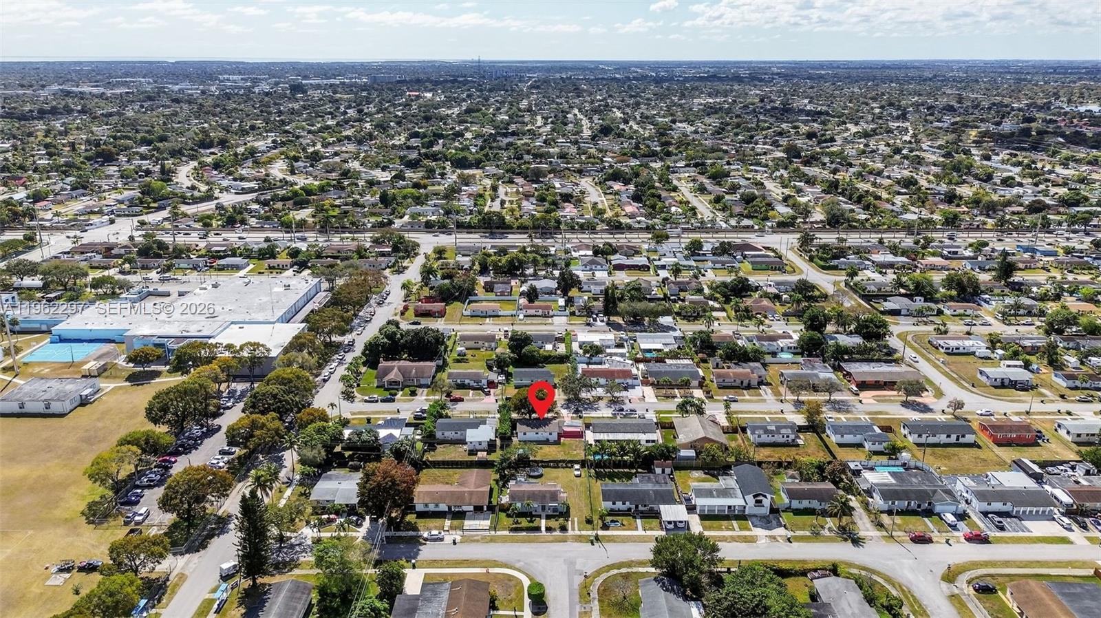 10325 Southwest 149th Terrace Miami, FL 33176 - Photo 24 of 34 an aerial view of a city