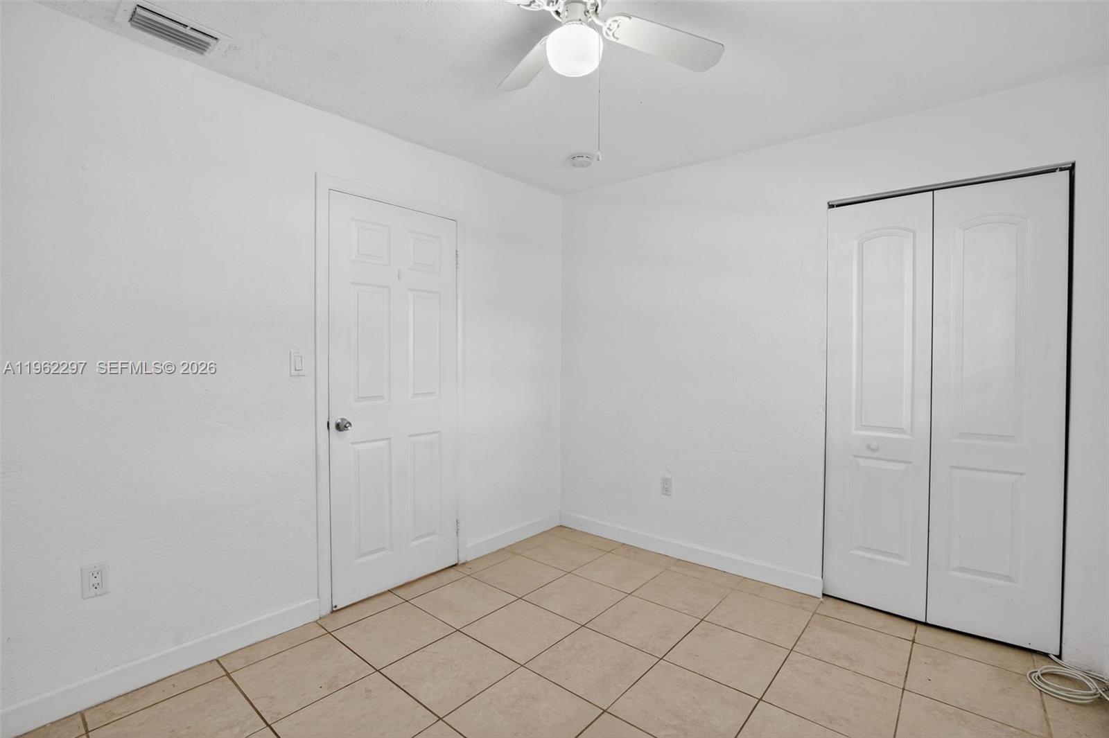 10325 Southwest 149th Terrace Miami, FL 33176 - Photo 6 of 34 a view of an empty room
