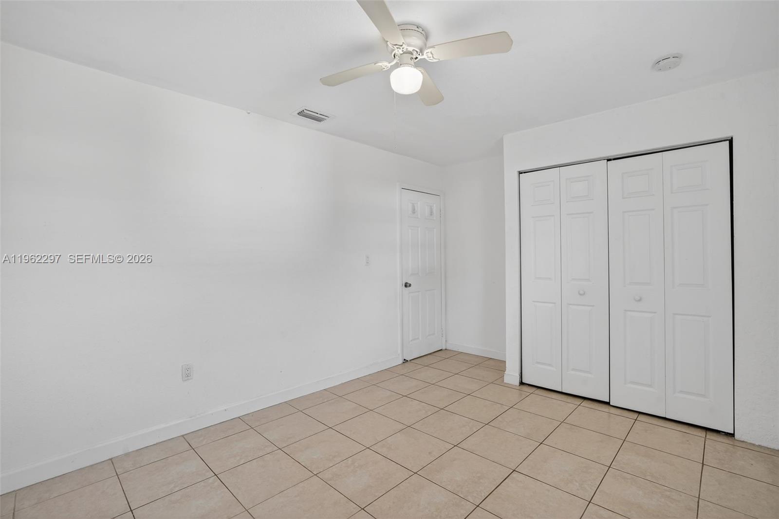 10325 Southwest 149th Terrace Miami, FL 33176 - Photo 10 of 34 a view of an empty room