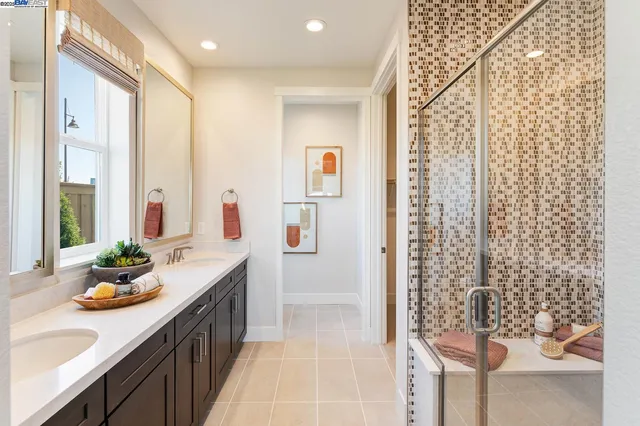 a bathroom with a sink and a shower curtain
