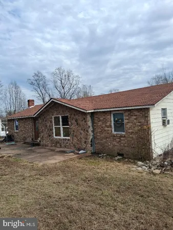 a front view of house with yard