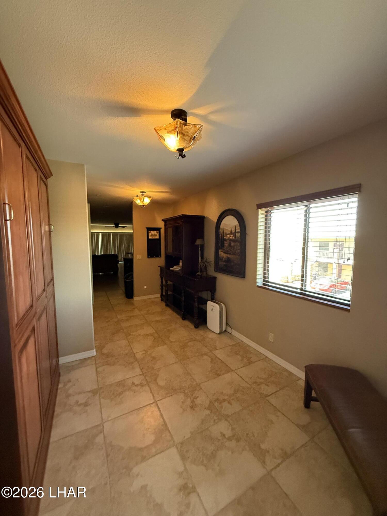 433 London Bridge Road, Unit B101 Lake Havasu City, AZ 86403 - Photo 10 of 35 a view of kitchen with furniture and a window